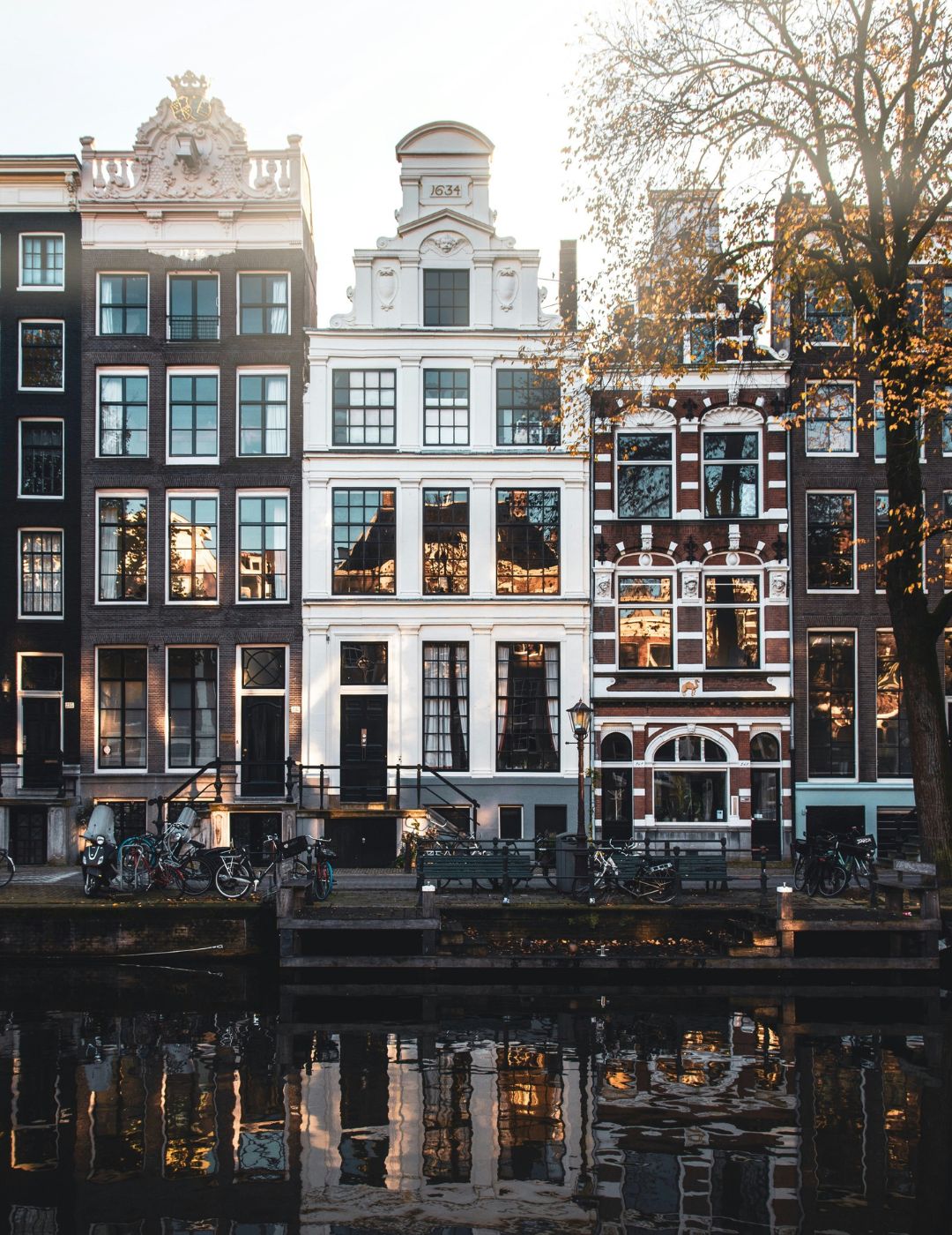 Elegant amsterdam canal houses along the waterway near the ambassade hotel.