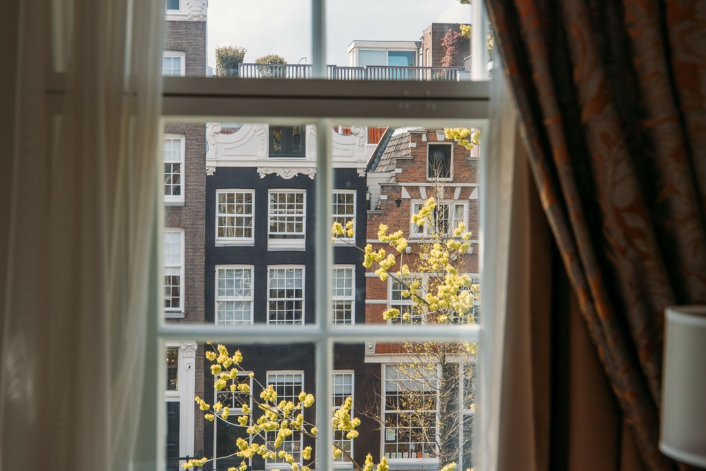 View over the canal from a canal view deluxe room at the ambassade hotel.