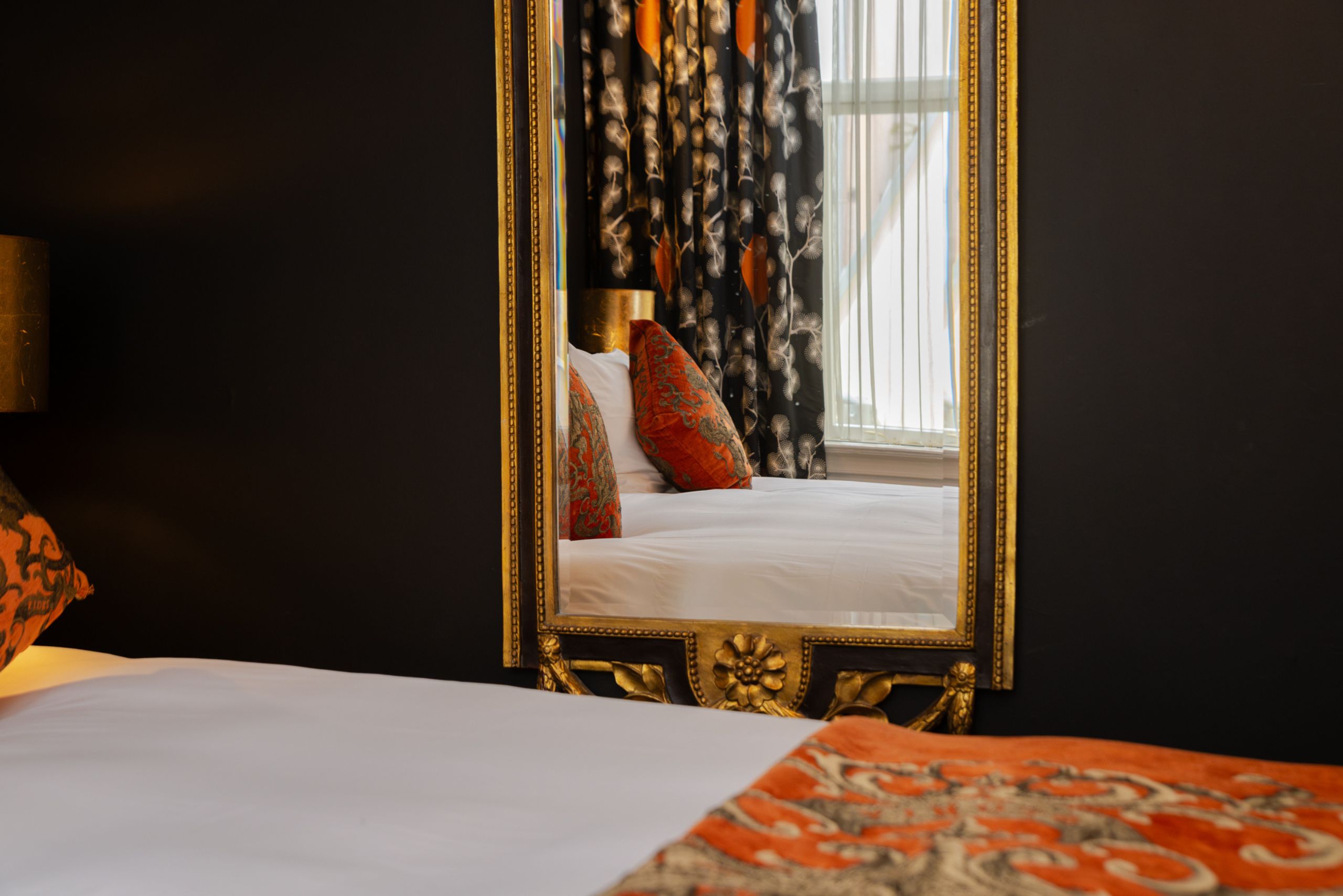 Unique room details showcasing historic architecture and varied décor at the ambassade hotel in amsterdam.