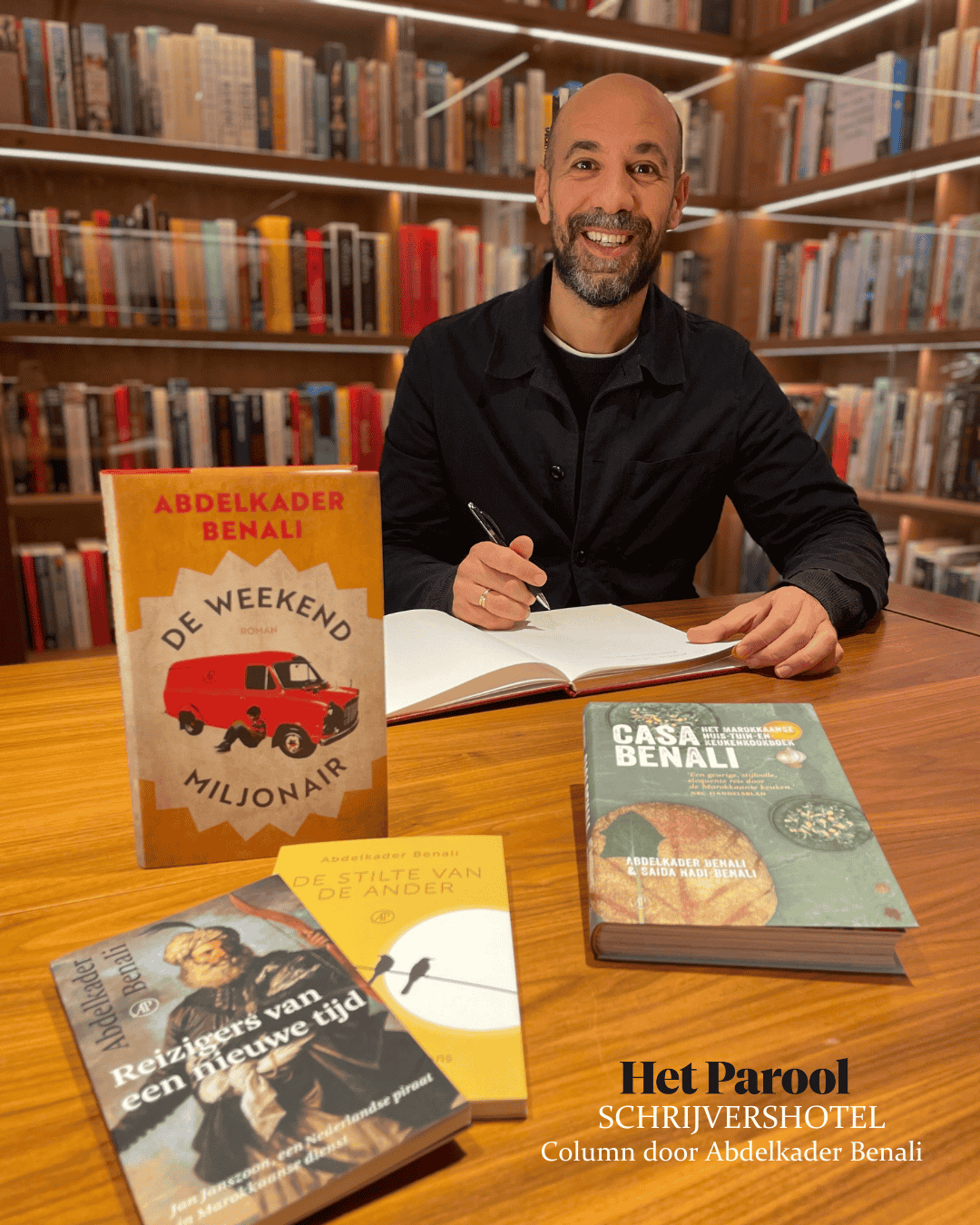 Author abdelkader benali signing his book at the ambassade hotel for the hotel library.