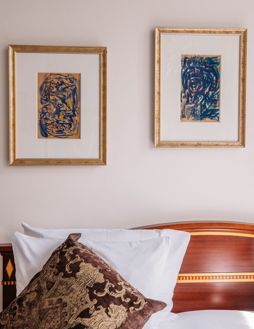 Artwork displayed in a classic deluxe room at the ambassade hotel.