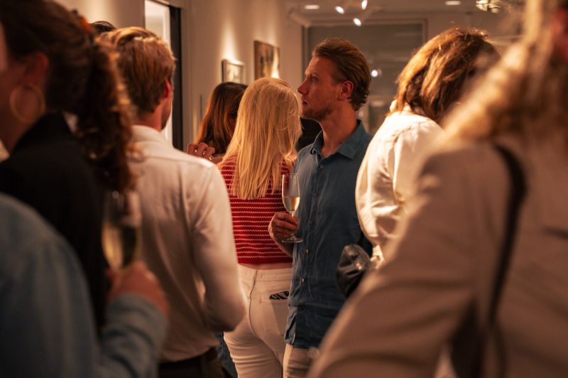 People viewing art at the ambassade art gallery in amsterdam